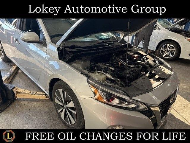 used 2021 Nissan Altima car, priced at $14,000