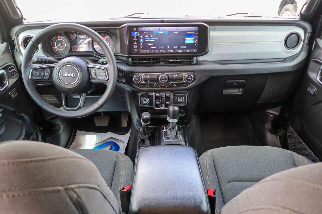 used 2024 Jeep Wrangler car, priced at $28,870