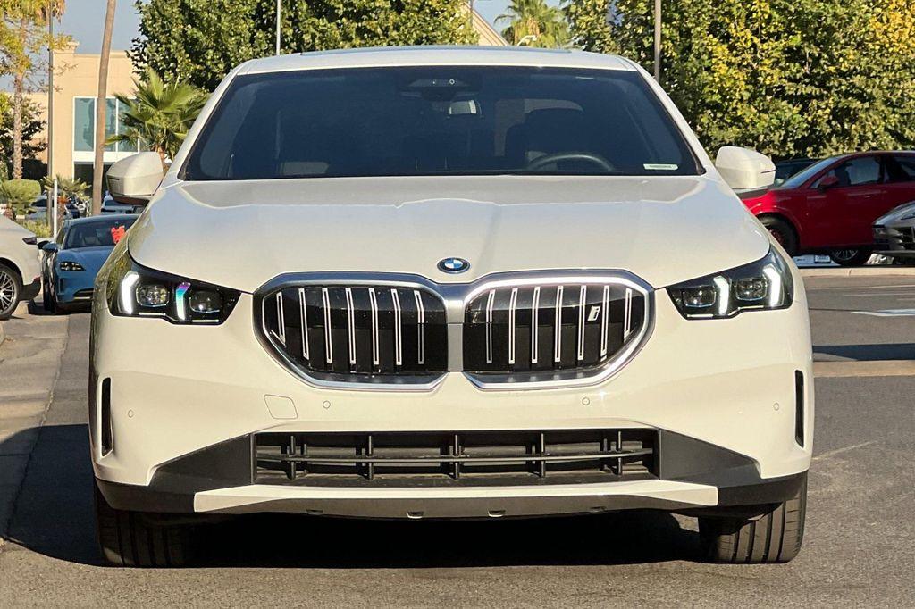 used 2024 BMW i5 car, priced at $45,399