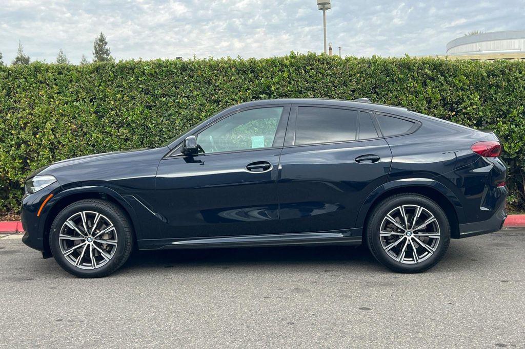 used 2022 BMW X6 car, priced at $52,999