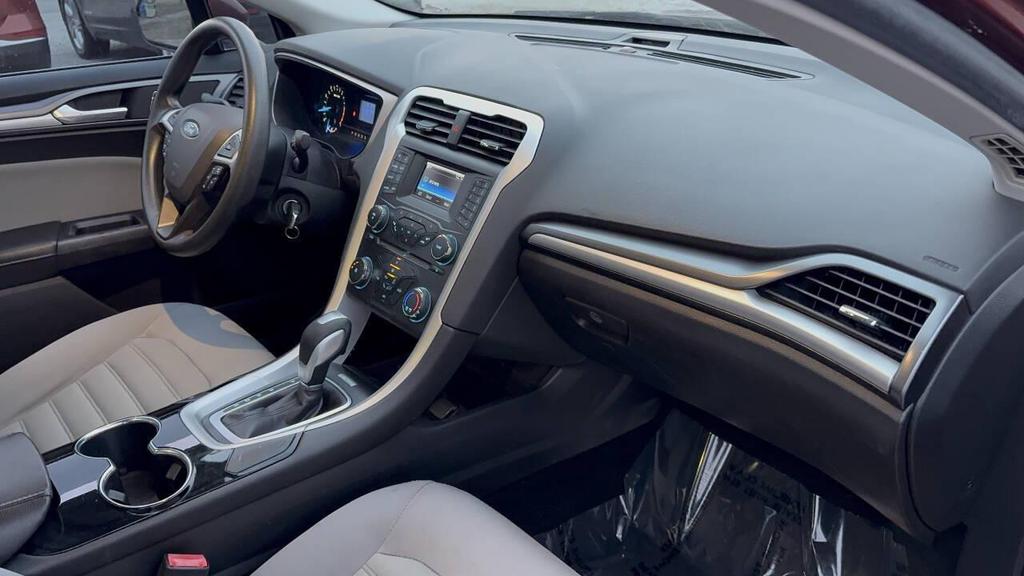 used 2014 Ford Fusion car, priced at $5,900