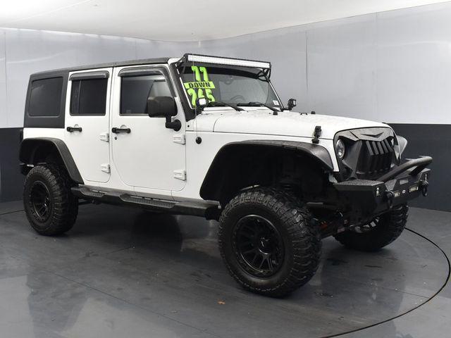 used 2013 Jeep Wrangler Unlimited car, priced at $13,777