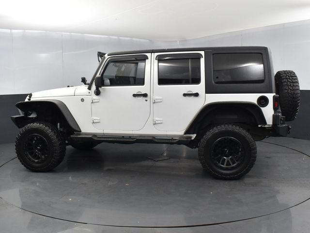 used 2013 Jeep Wrangler Unlimited car, priced at $13,777