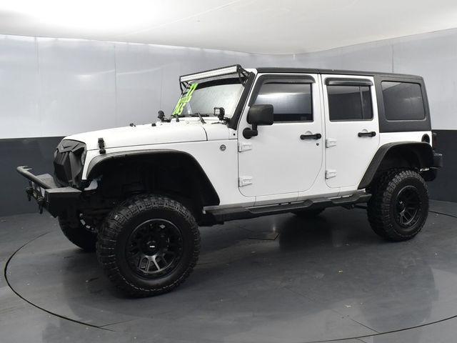 used 2013 Jeep Wrangler Unlimited car, priced at $13,777