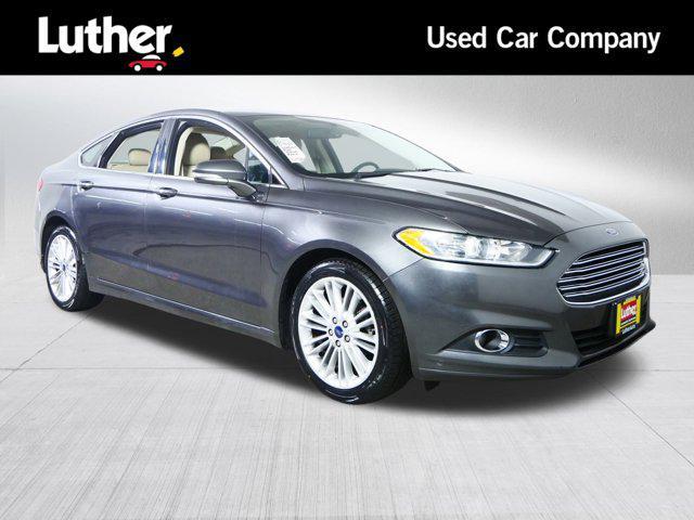 used 2016 Ford Fusion car, priced at $7,498