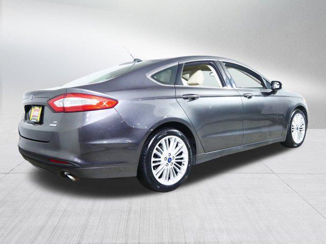 used 2016 Ford Fusion car, priced at $7,498