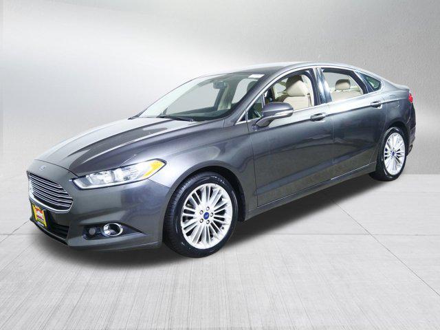 used 2016 Ford Fusion car, priced at $7,498