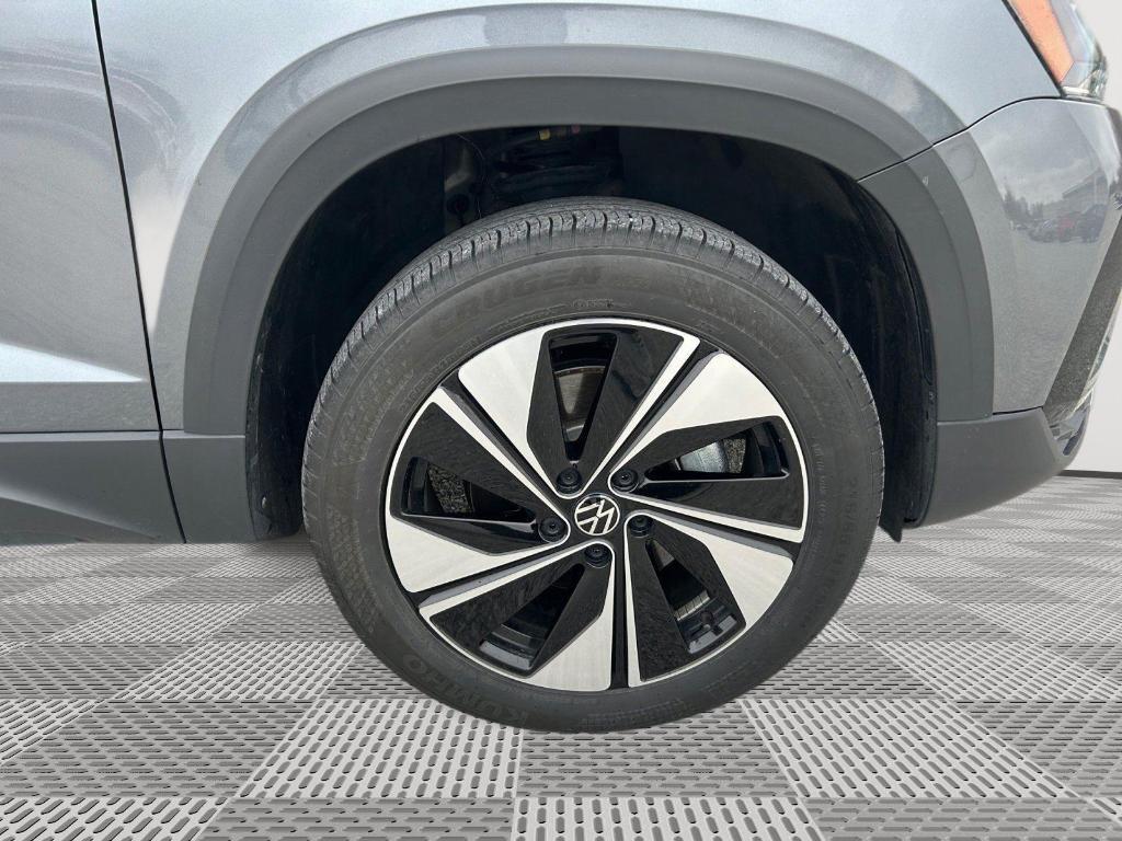 used 2024 Volkswagen Taos car, priced at $25,000