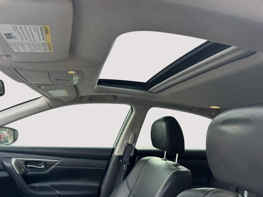 used 2014 Nissan Altima car, priced at $10,000