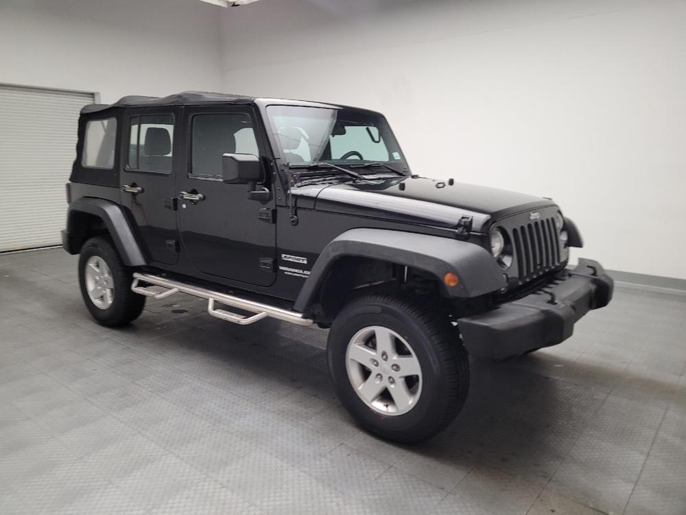 used 2015 Jeep Wrangler Unlimited car, priced at $19,895