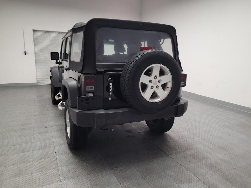 used 2015 Jeep Wrangler Unlimited car, priced at $19,895