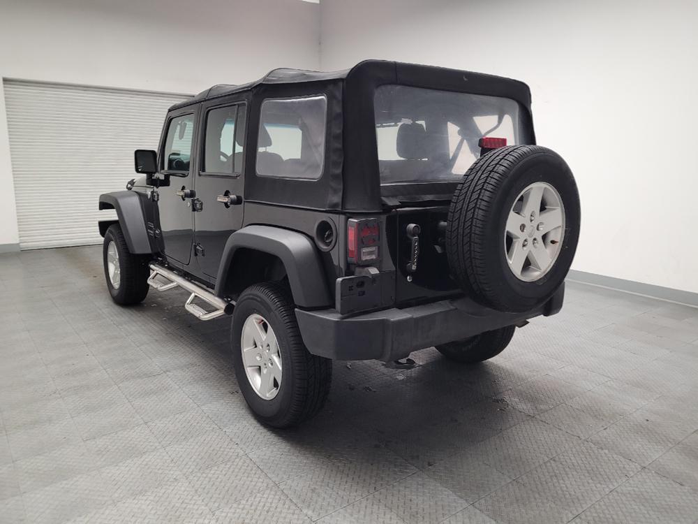 used 2015 Jeep Wrangler Unlimited car, priced at $19,895