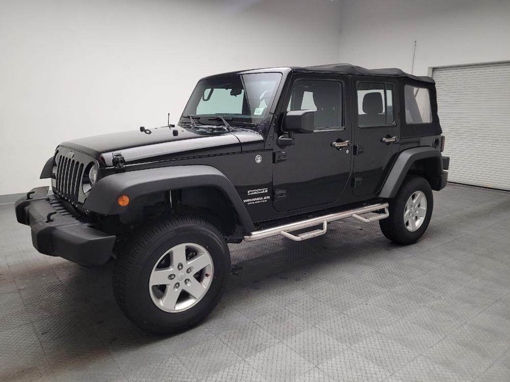used 2015 Jeep Wrangler Unlimited car, priced at $19,895