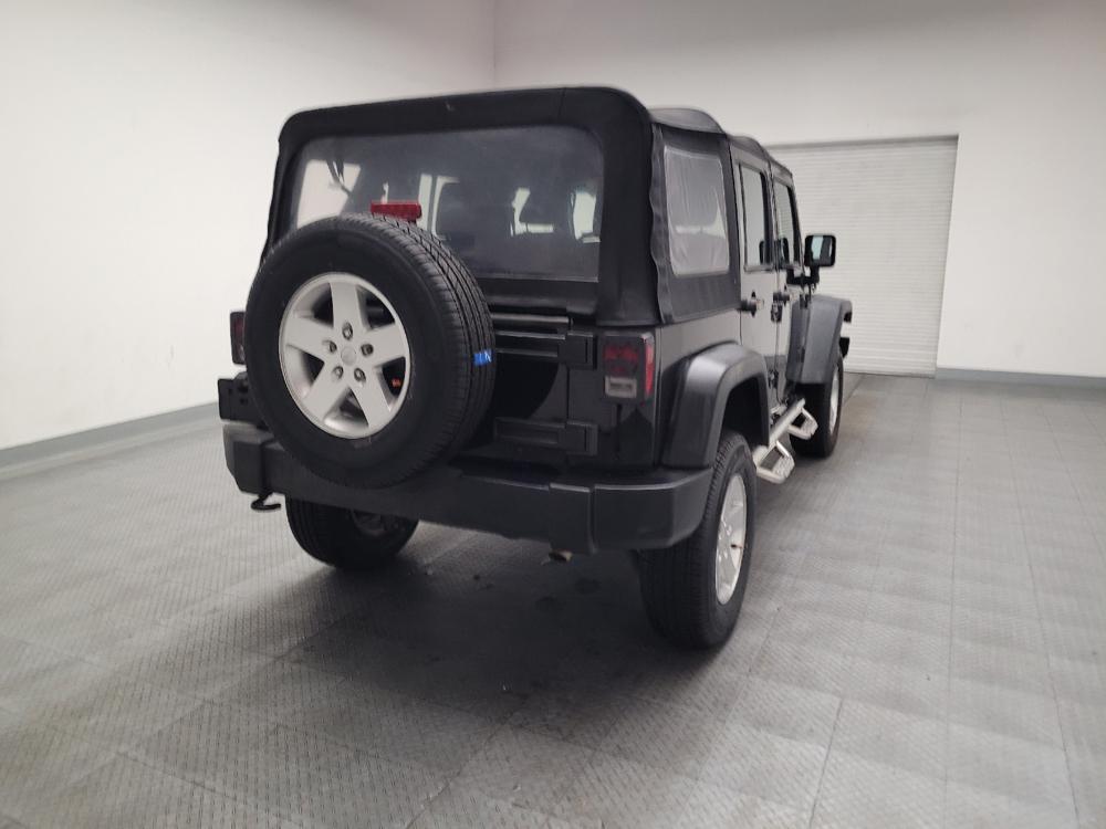 used 2015 Jeep Wrangler Unlimited car, priced at $19,895