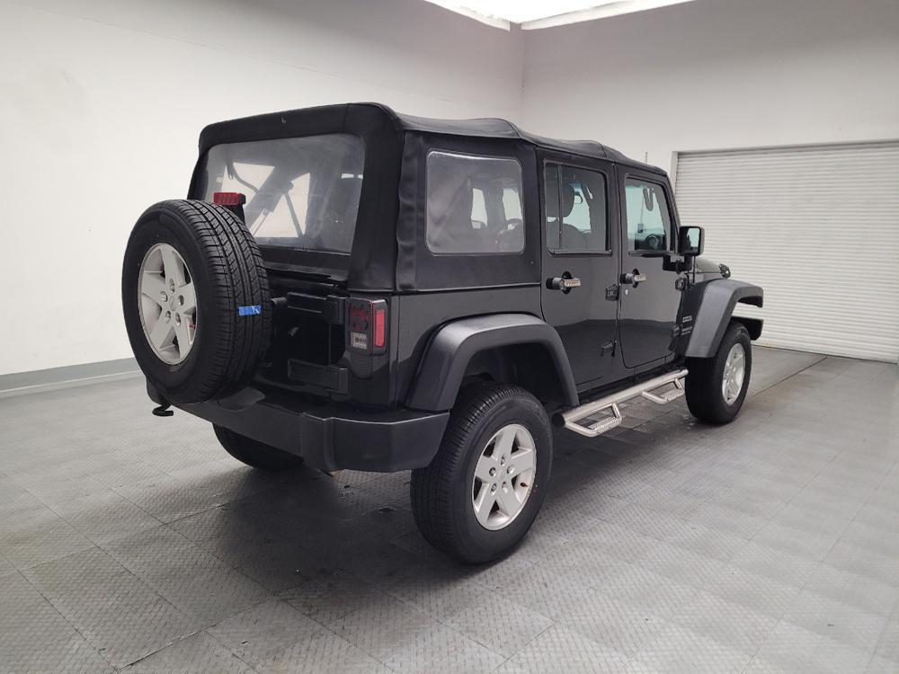 used 2015 Jeep Wrangler Unlimited car, priced at $19,895