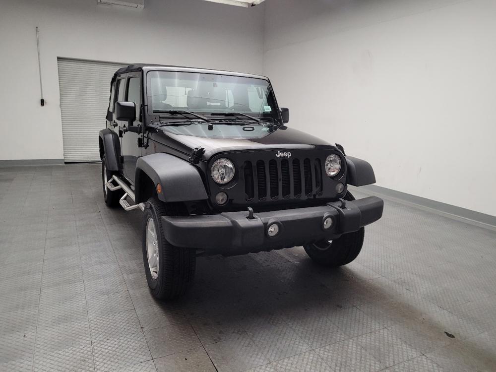 used 2015 Jeep Wrangler Unlimited car, priced at $19,895