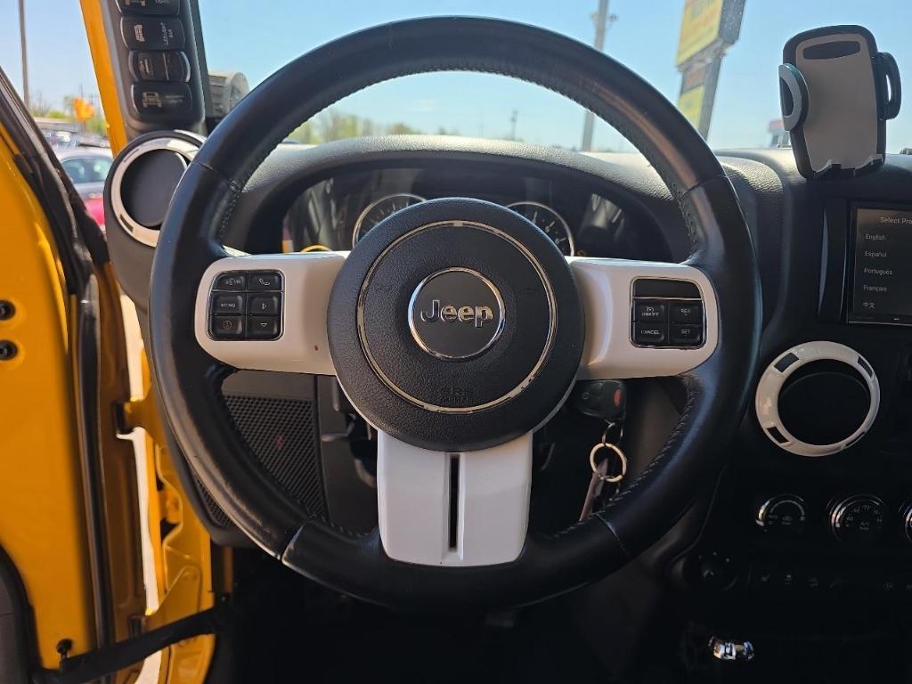 used 2015 Jeep Wrangler Unlimited car, priced at $15,350