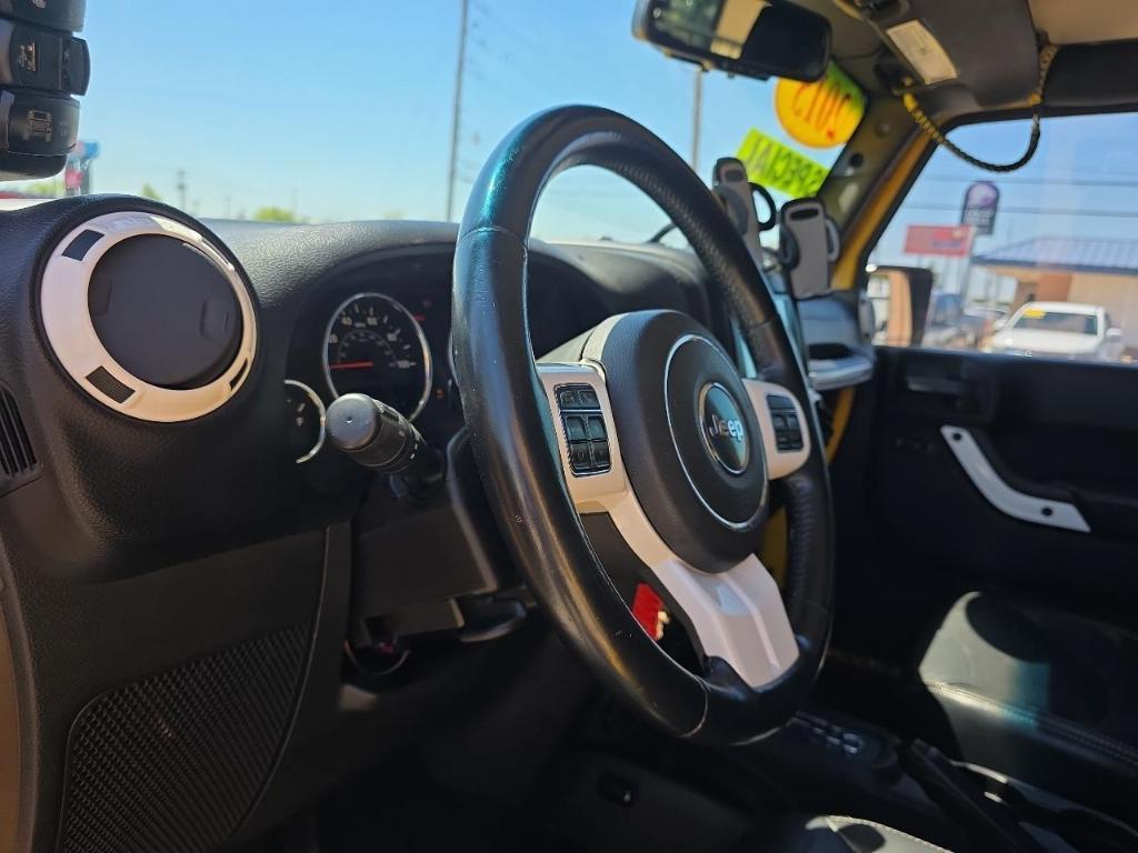used 2015 Jeep Wrangler Unlimited car, priced at $15,350
