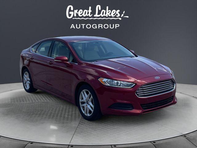 used 2016 Ford Fusion car, priced at $10,189