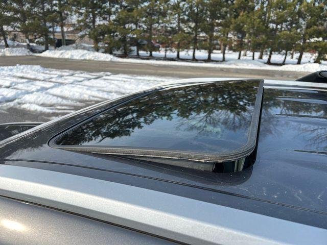 used 2024 Toyota Highlander Hybrid car, priced at $40,988