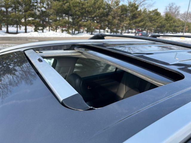 used 2024 Toyota Highlander Hybrid car, priced at $40,988