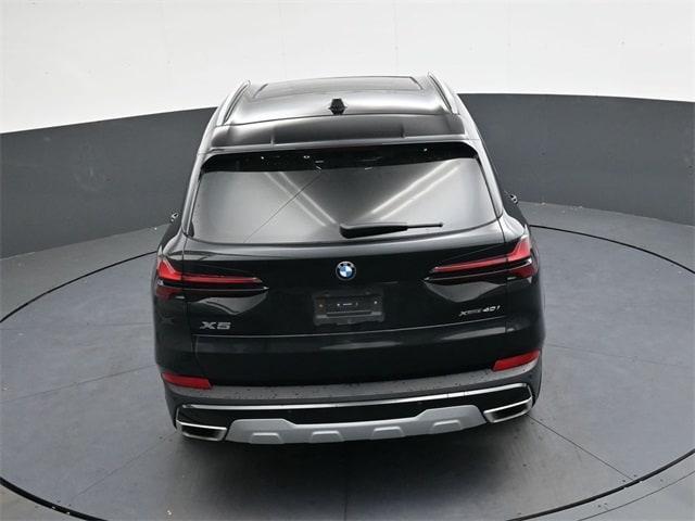 used 2025 BMW X5 car, priced at $59,304