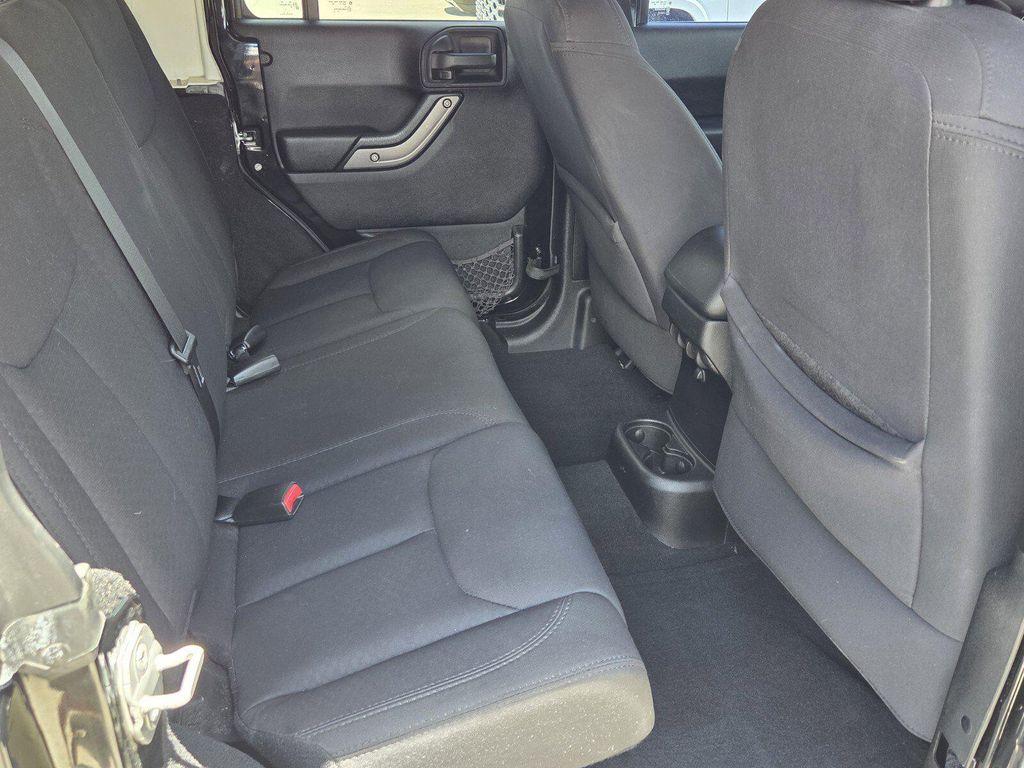 used 2014 Jeep Wrangler Unlimited car, priced at $16,998