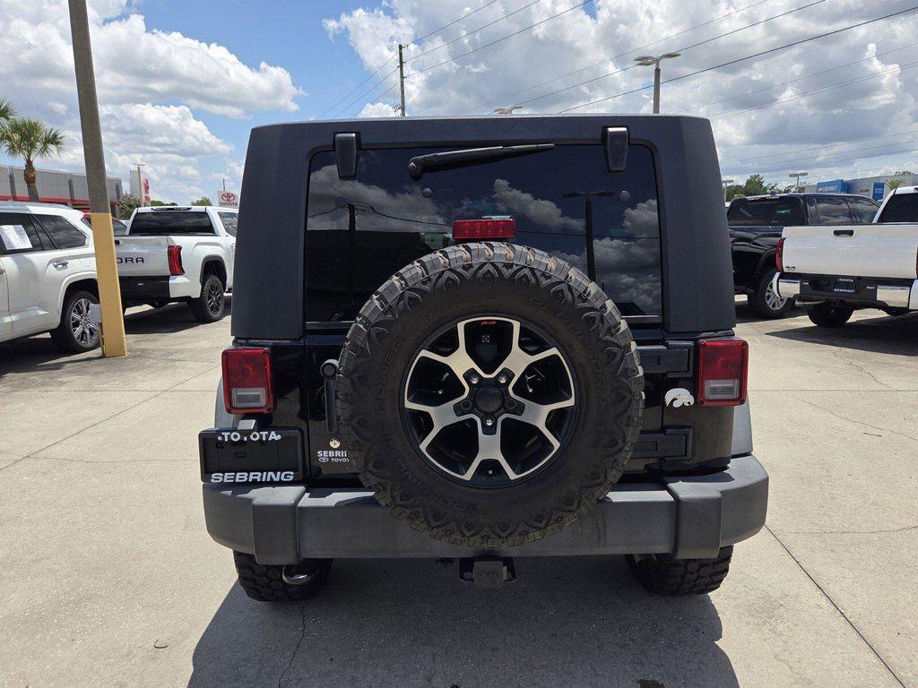 used 2014 Jeep Wrangler Unlimited car, priced at $16,998