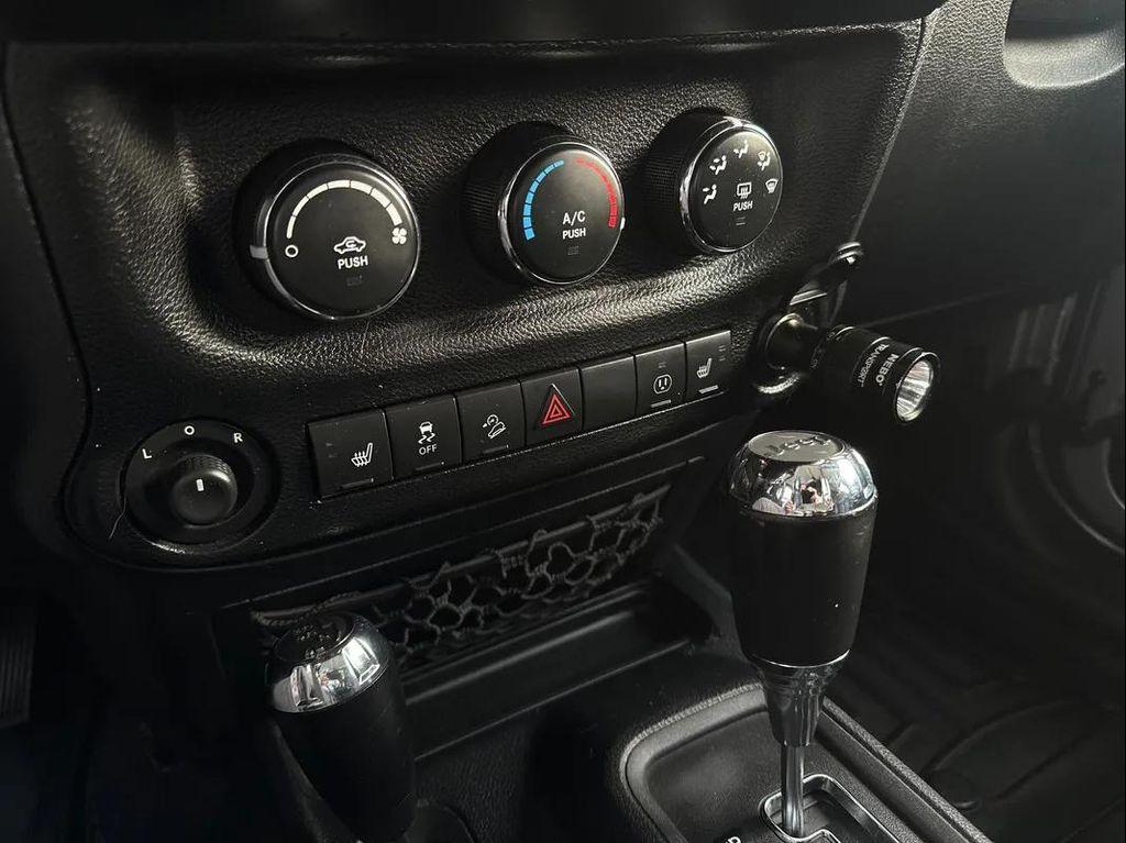 used 2014 Jeep Wrangler Unlimited car, priced at $15,988