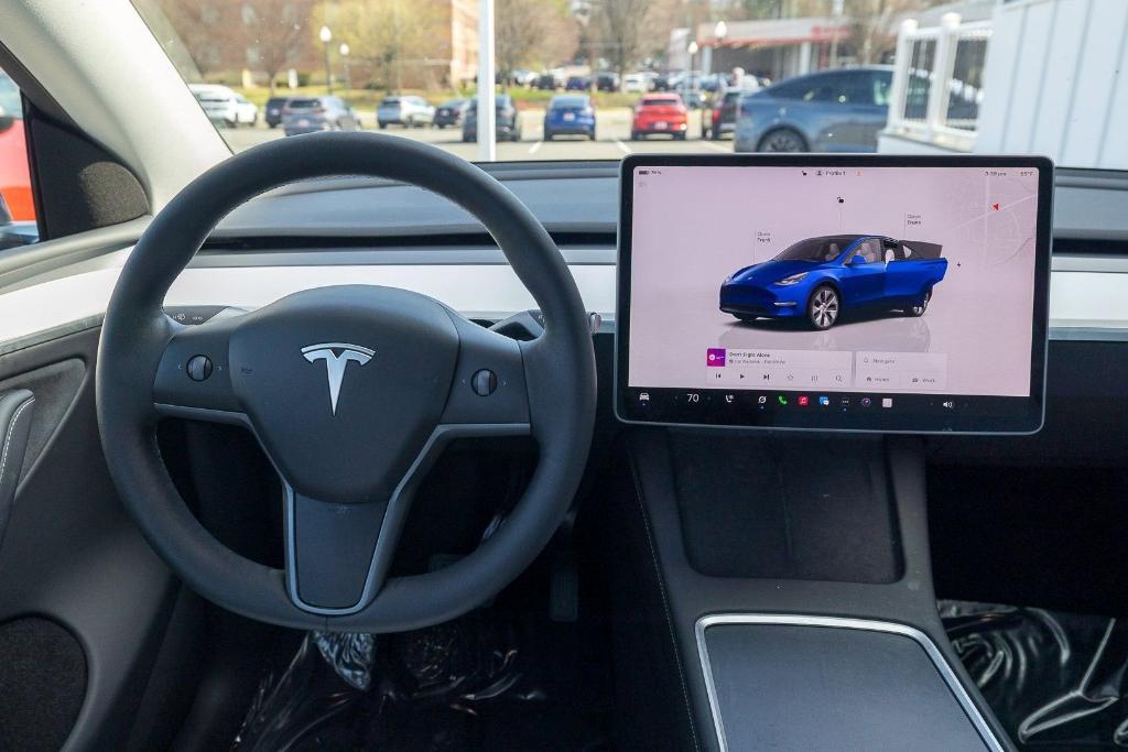 used 2024 Tesla Model Y car, priced at $35,731