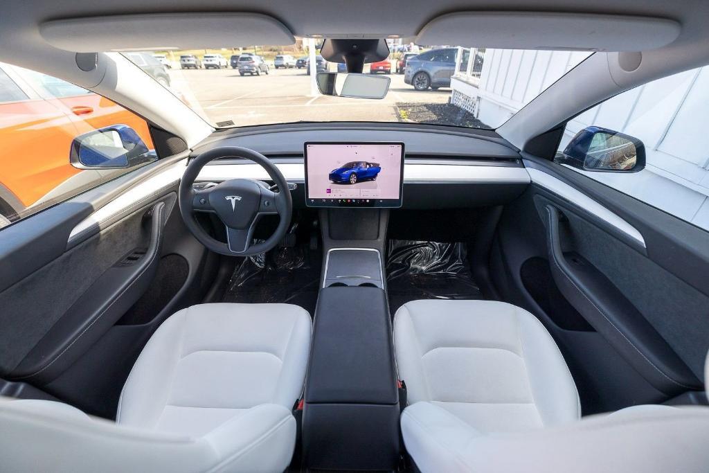 used 2024 Tesla Model Y car, priced at $35,731