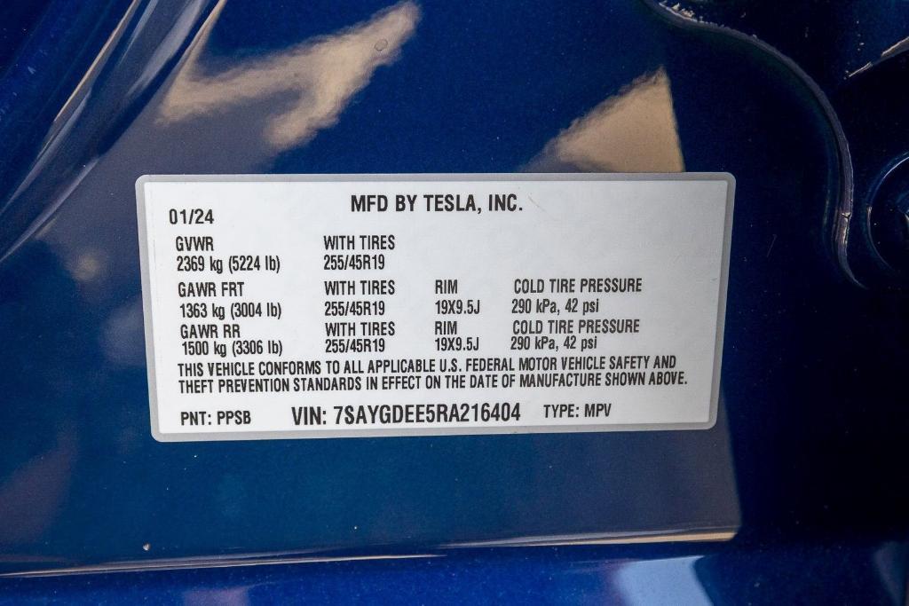 used 2024 Tesla Model Y car, priced at $35,731