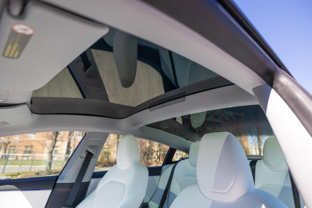 used 2025 Tesla Model 3 car, priced at $36,158