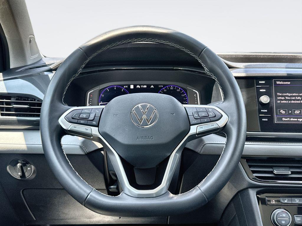 used 2023 Volkswagen Taos car, priced at $24,800