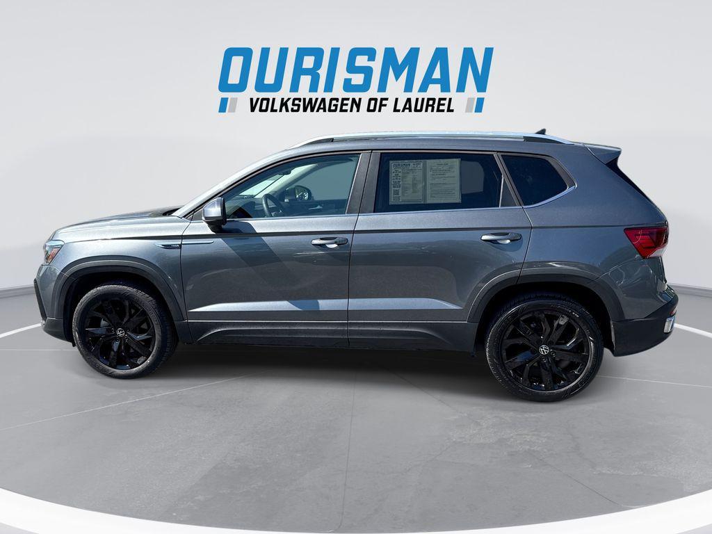 used 2023 Volkswagen Taos car, priced at $21,600
