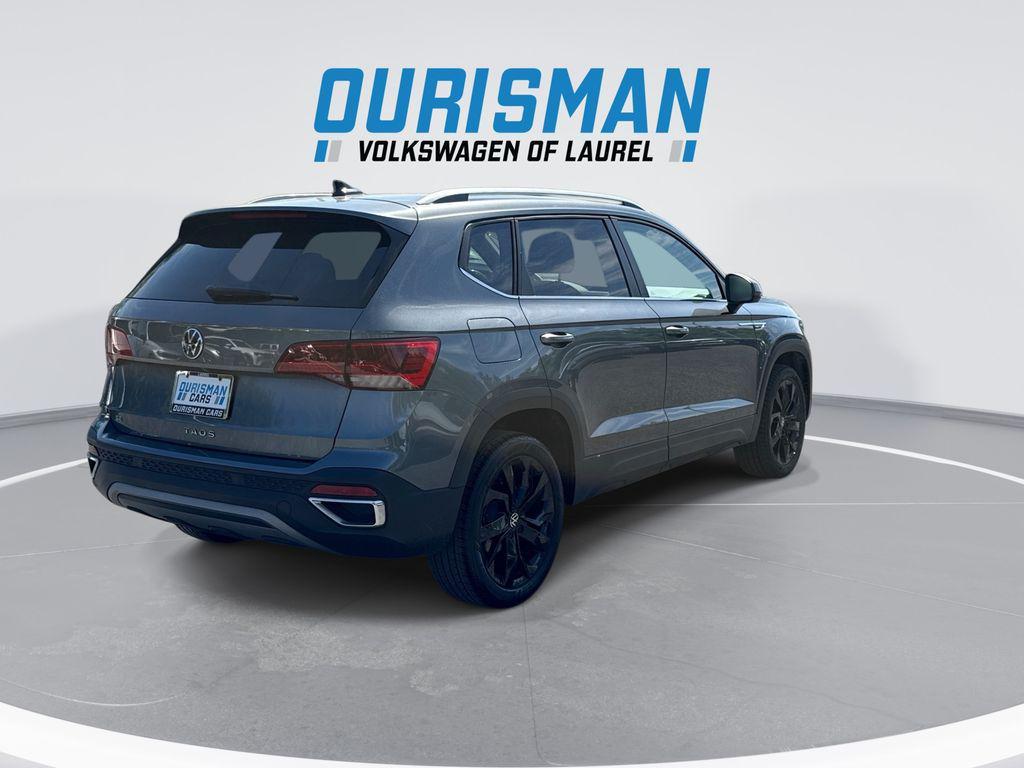 used 2023 Volkswagen Taos car, priced at $21,600