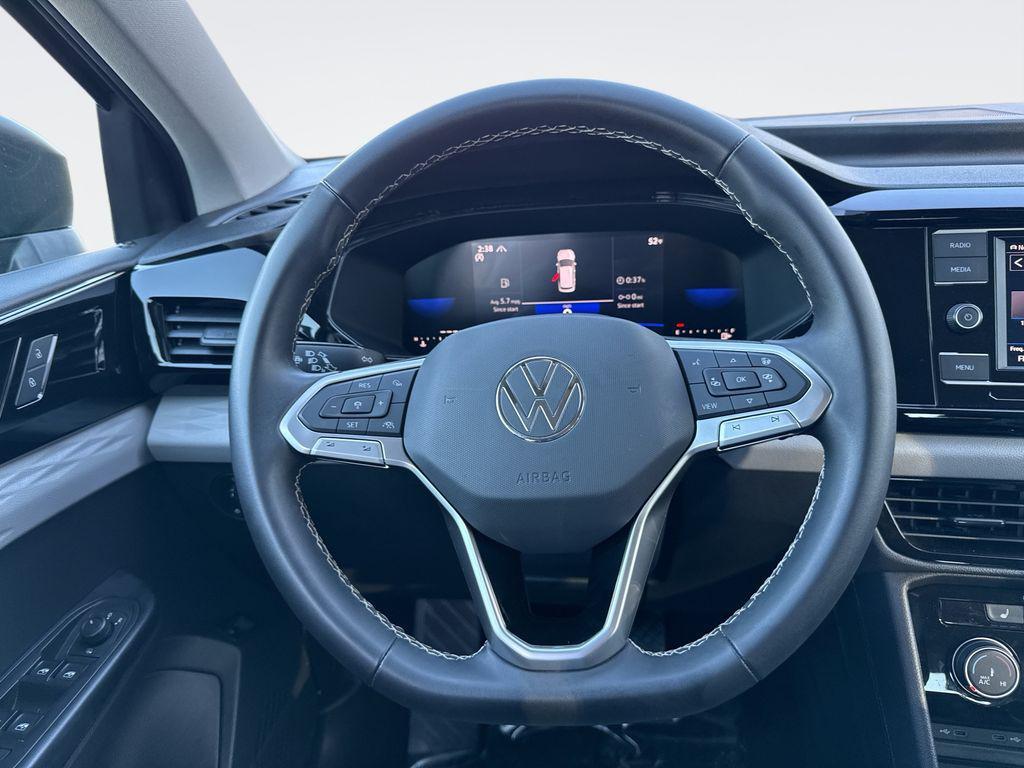 used 2023 Volkswagen Taos car, priced at $21,400