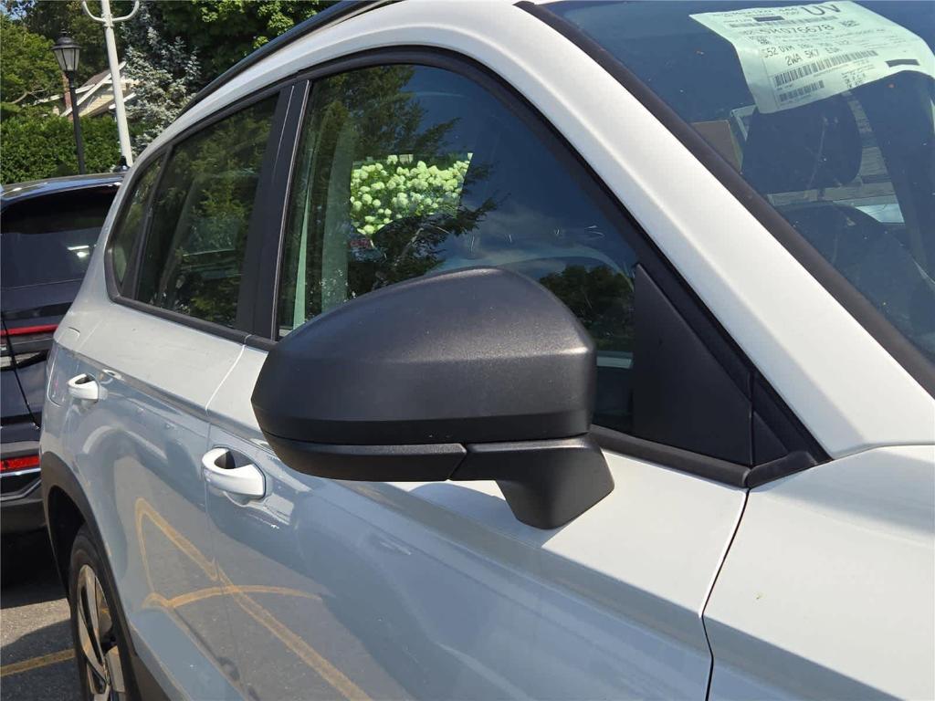 new 2025 Volkswagen Taos car, priced at $25,676