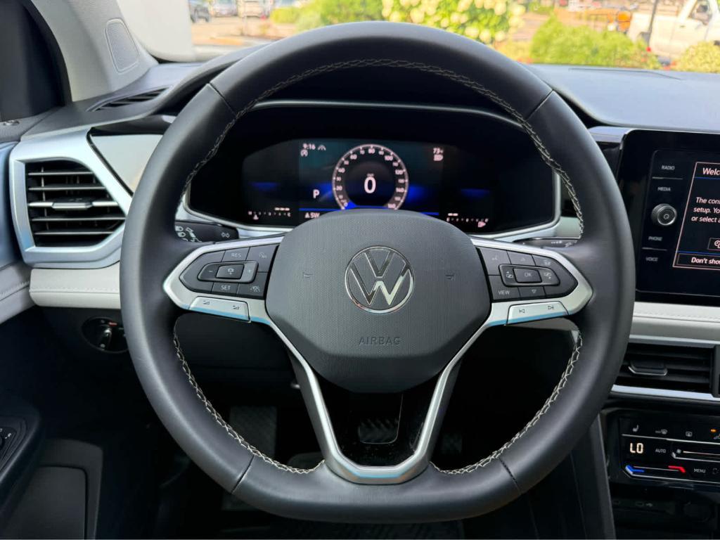 used 2026 Volkswagen Taos car, priced at $28,494