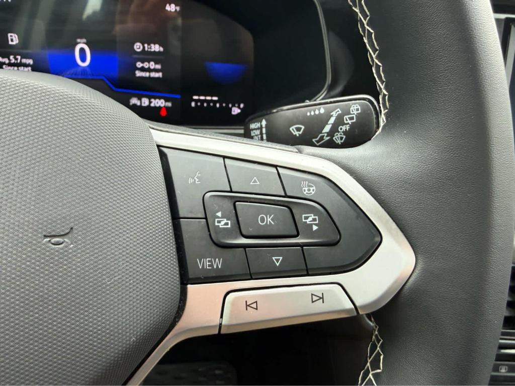 used 2024 Volkswagen Taos car, priced at $20,995