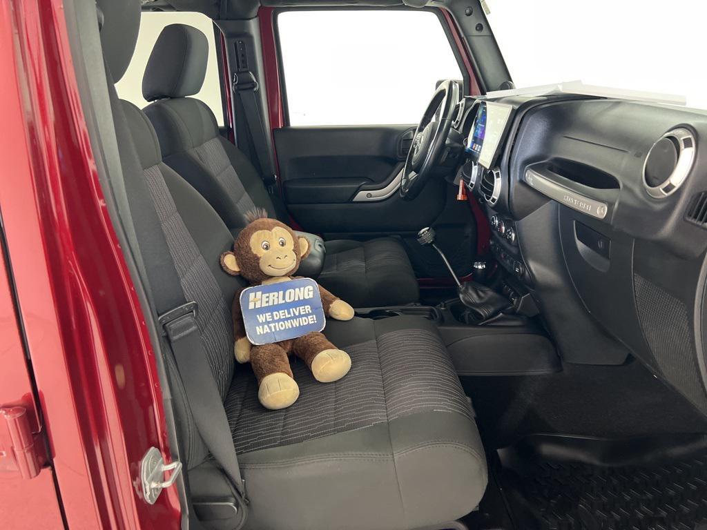used 2012 Jeep Wrangler Unlimited car, priced at $18,590