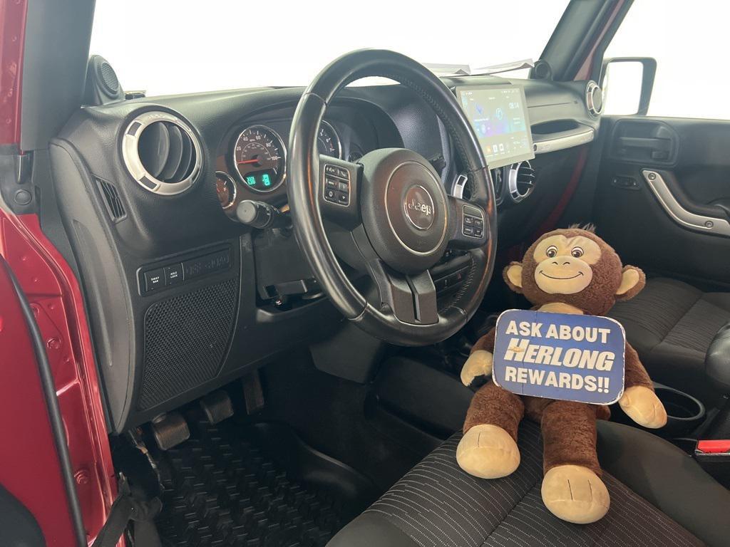 used 2012 Jeep Wrangler Unlimited car, priced at $18,590