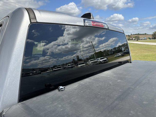 used 2021 Ram 1500 car, priced at $26,997