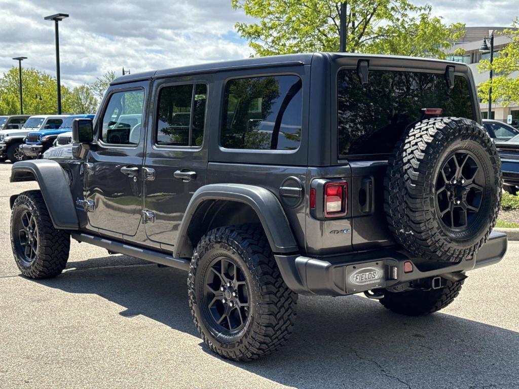 used 2025 Jeep Wrangler 4xe car, priced at $31,169