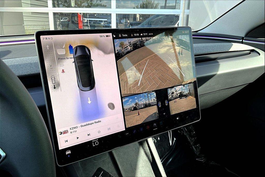 used 2025 Tesla Model 3 car, priced at $37,994