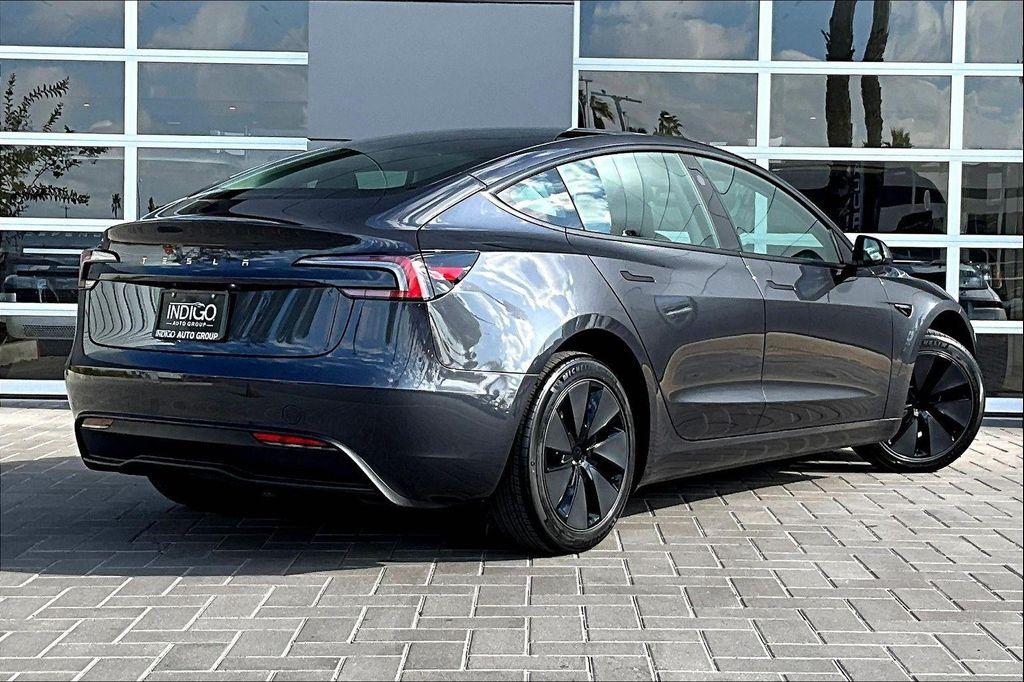 used 2025 Tesla Model 3 car, priced at $37,994