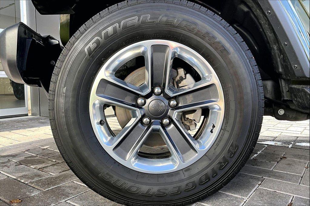 used 2021 Jeep Wrangler Unlimited car, priced at $23,874