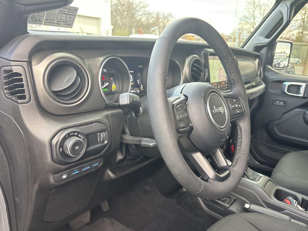 used 2023 Jeep Wrangler 4xe car, priced at $31,890