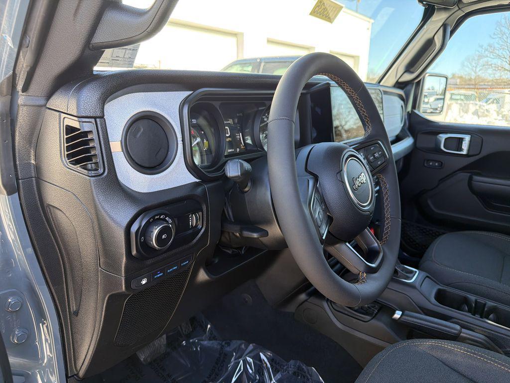 used 2024 Jeep Wrangler 4xe car, priced at $31,890