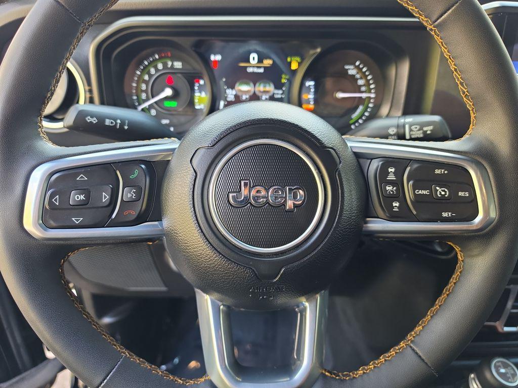 used 2024 Jeep Wrangler 4xe car, priced at $30,696